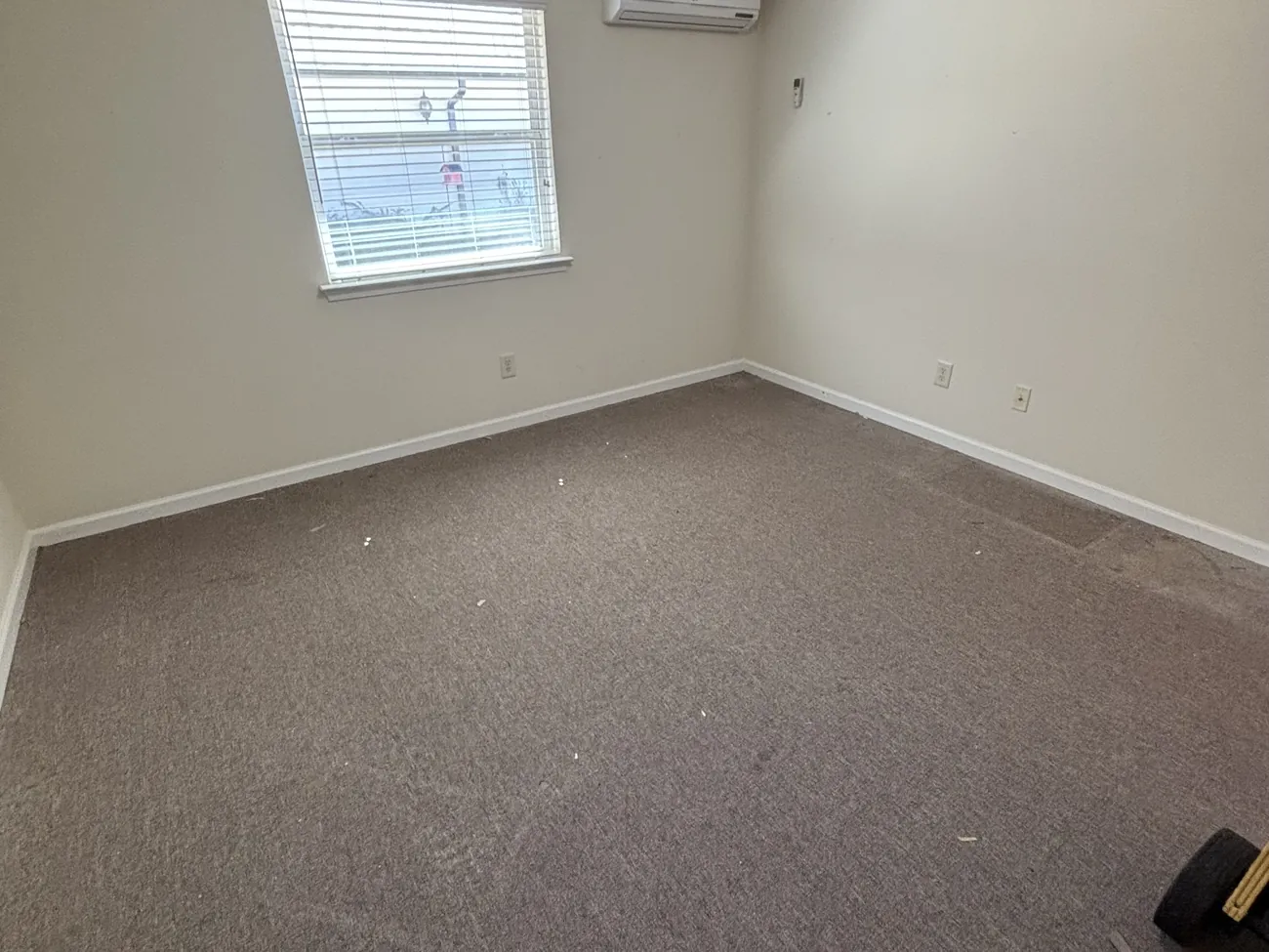 The same bedroom after the recliner and dressers were removed