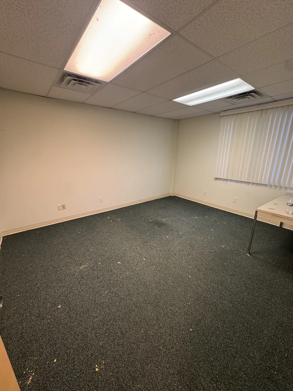 The same office after the furniture was removed