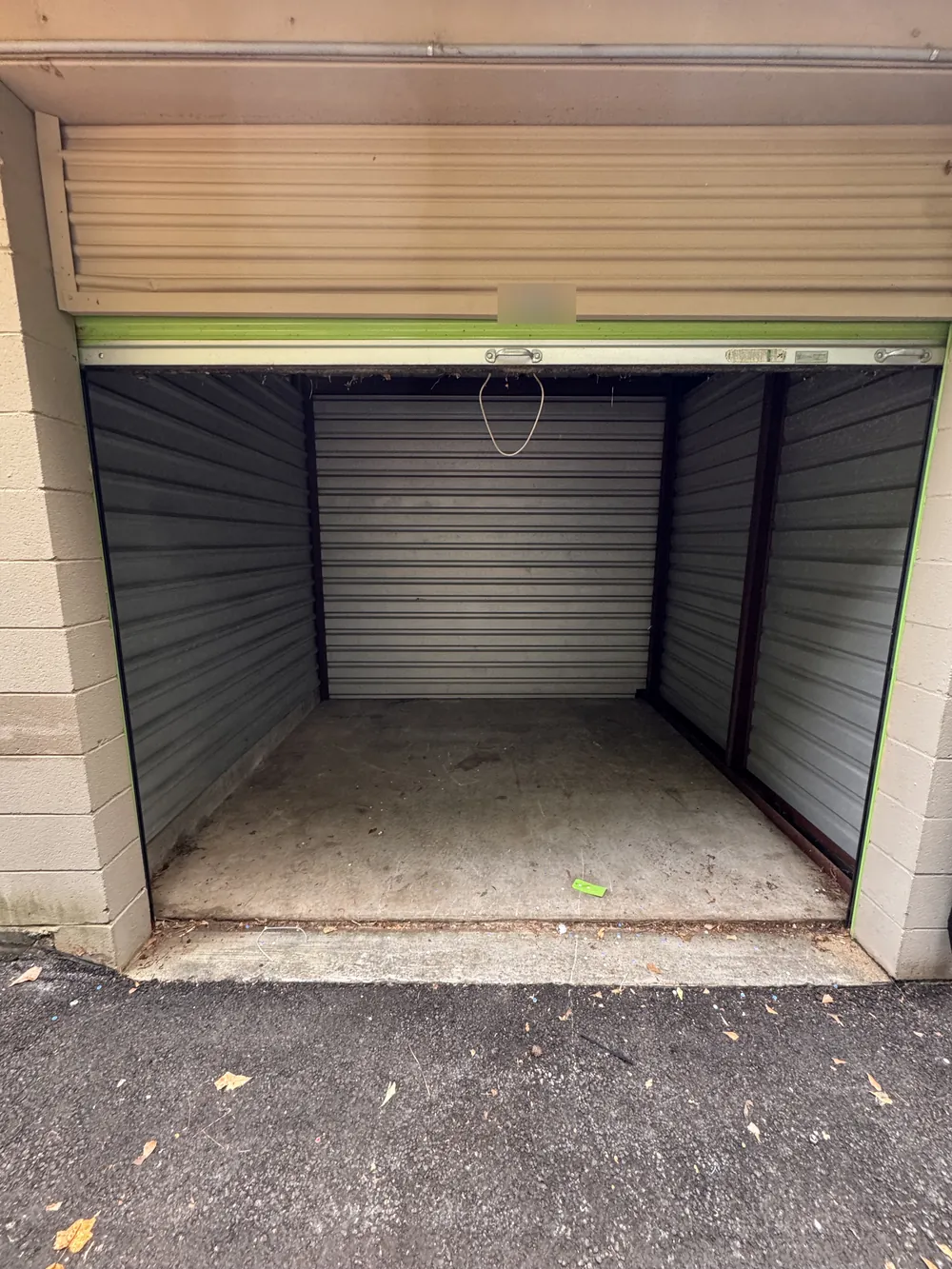 The same storage unit after the cleanout, empty