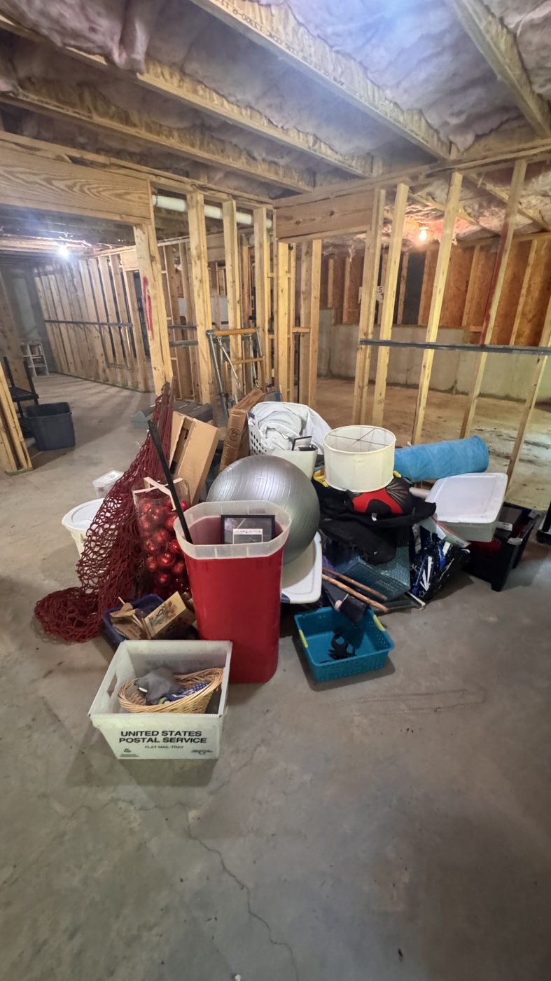 Before junk removal in Cumming, GA: basement cleanout